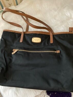 Michael Kors Black Tote with Brown Leather Trim and Gold Hardware